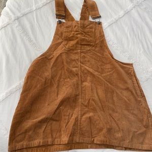 Brown overall dress.